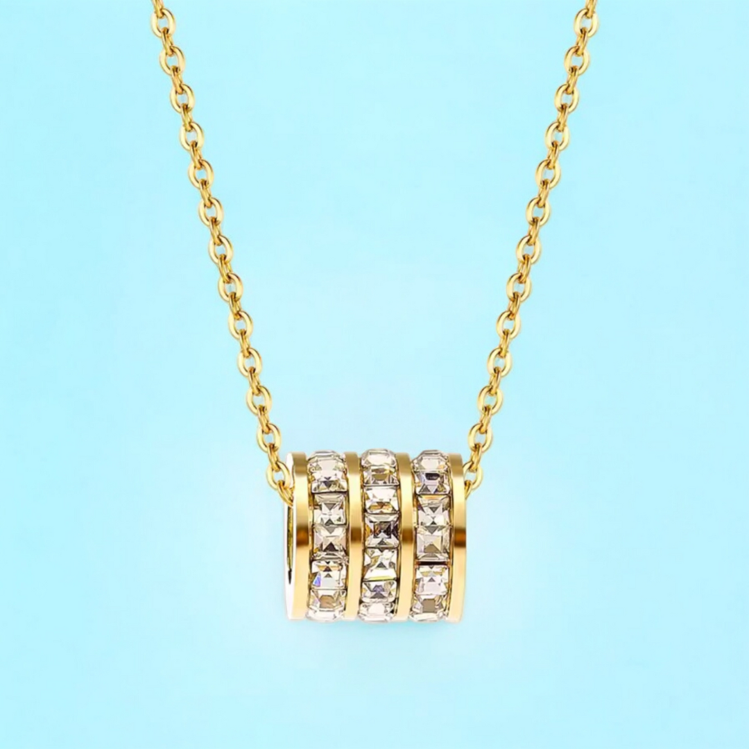Astrid Cylinder Necklace: Jooelri London's 18K gold plated. Waterproof, non-tarnish stainless steel with zircons. Gym-proof, shower-proof! Free shipping!