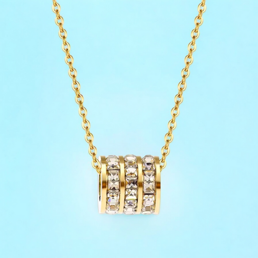 Astrid Cylinder Necklace: Jooelri London's 18K gold plated. Waterproof, non-tarnish stainless steel with zircons. Gym-proof, shower-proof! Free shipping! 